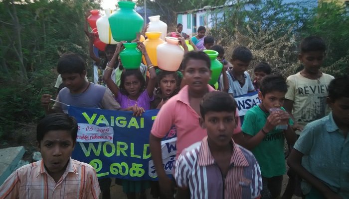 Children with VAIGAI banner at an awareness event