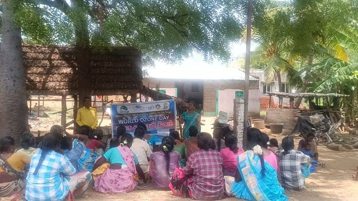 Community meeting under the trees